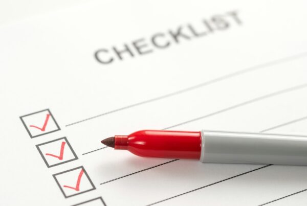 Payroll Checklist box with red marker pen